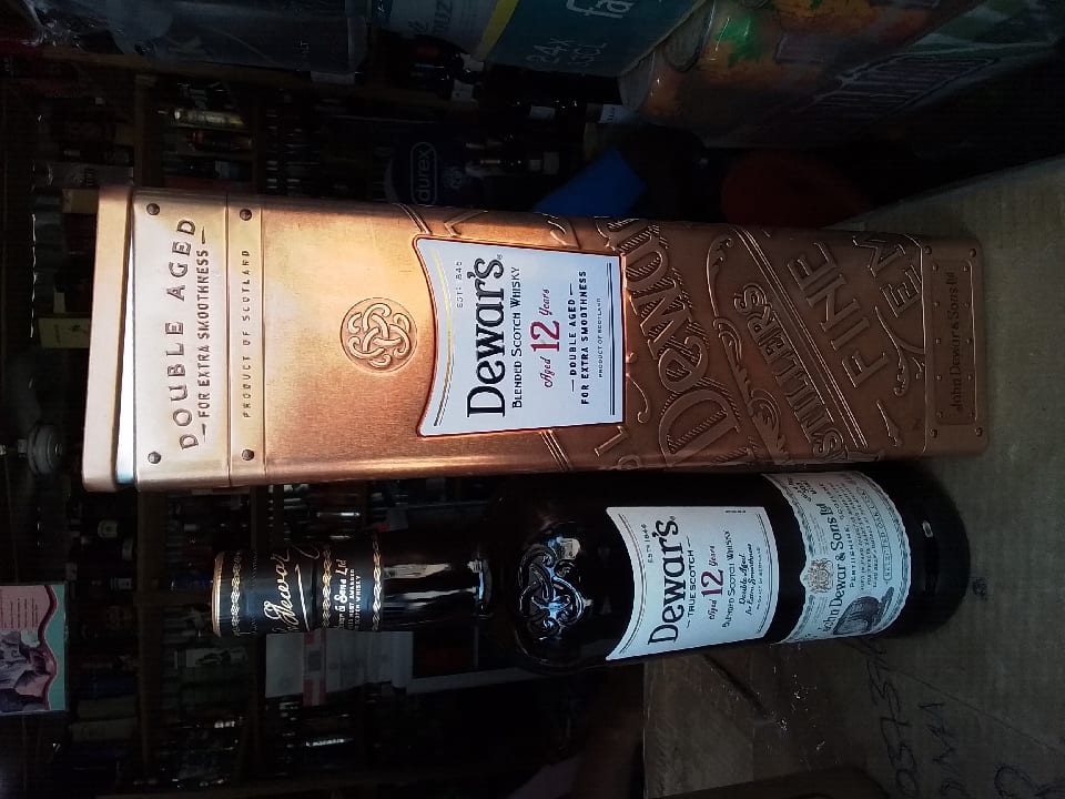 Dewars true scotch 12 years